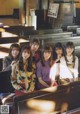 A group of young women sitting in a church.