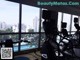 a gym with a view of the city