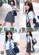 A woman in a school uniform is walking down the street.